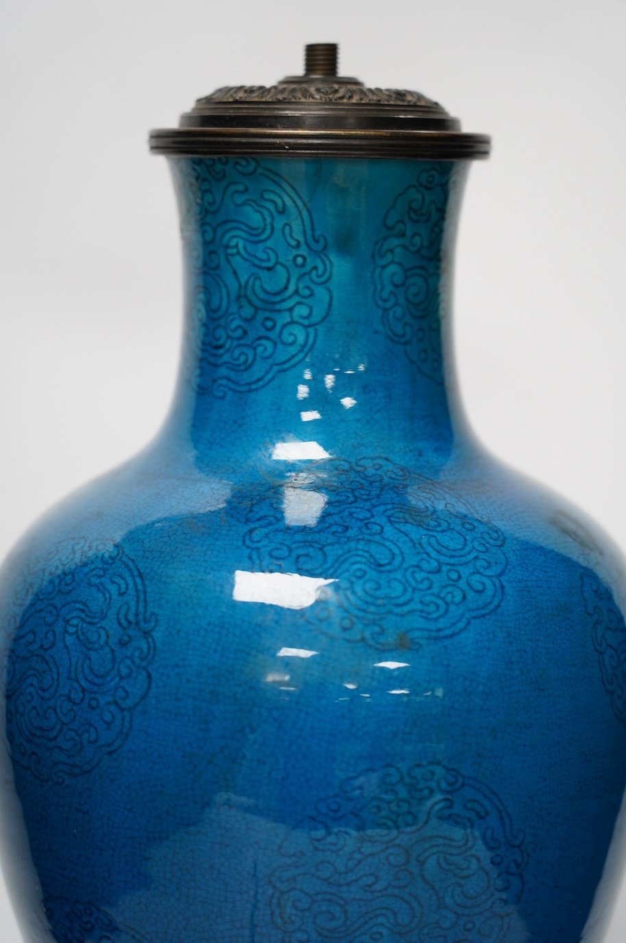 A Chinese blue glazed vase converted to a lamp base, 47cm high. Condition - fair, crazing throughout